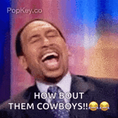 Man In Suit Laughing Saying How Bout Them Cowboys GIF