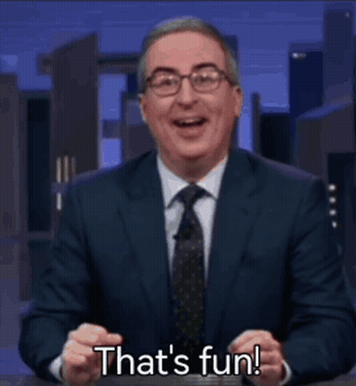 Man In Suit Laughing Saying That's Fun GIF