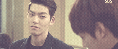 Man In Suit Looking At Another Man In SBS Advertisement GIF