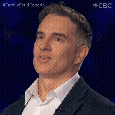 Man In Suit Looking At Camera Family Feud Canada GIF