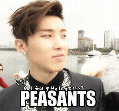 Man In Suit Looking At Camera Saying Peasants GIF