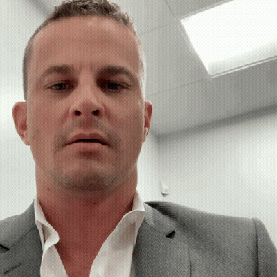 Man In Suit Looking At Camera With Mouth Open GIF