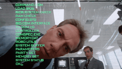 Man In Suit Looking At Command.com Screen GIF