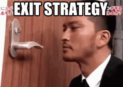 Man In Suit Looking At Exit Strategy Door GIF