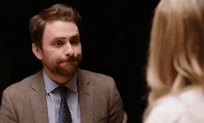 Man In Suit Looking At Woman GIF