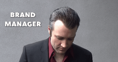 Man In Suit Looking Down Brand Manager GIF