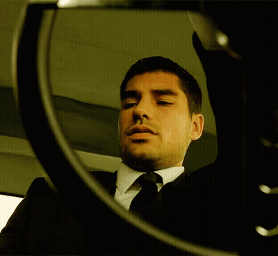 Man In Suit Looking In Mirror GIF