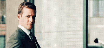 Man In Suit Looking Out Window GIF