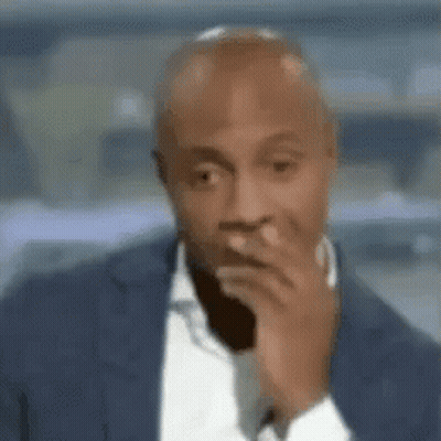 Man In Suit Looking Over Shoulder Blurry GIF
