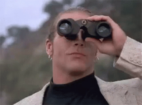 Man In Suit Looking Through Binoculars GIF