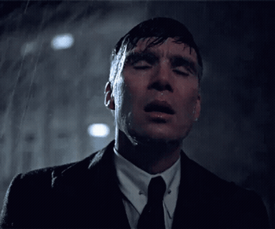 Man In Suit Looking Up At Sky GIF