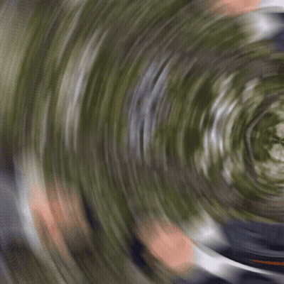 Man In Suit Lying On Ground GIF