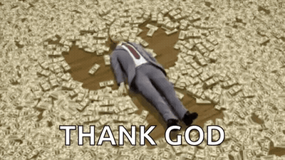 Man In Suit Lying On Pile Of Money Saying Thank God GIF