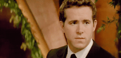 Man In Suit Making Face GIF