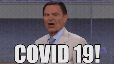 Man In Suit Making Face Says Covid 19 GIF