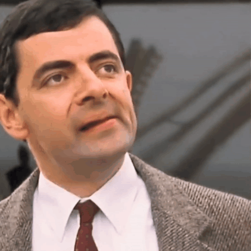 Man In Suit Making Face GIF