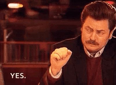 Man In Suit Making Fist And Saying Yes GIF