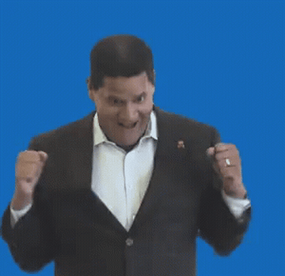 Man In Suit Making Fist GIF