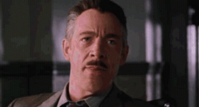 Man In Suit Making Funny Face GIF