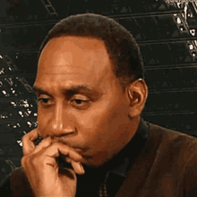 Man In Suit Making Funny Face GIF