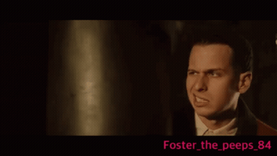 Man In Suit Making Funny Face GIF