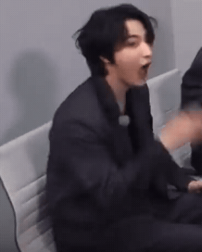 Man In Suit Making Funny Face GIF