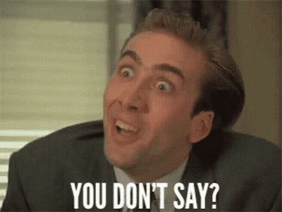 Man In Suit Making Funny Face GIF