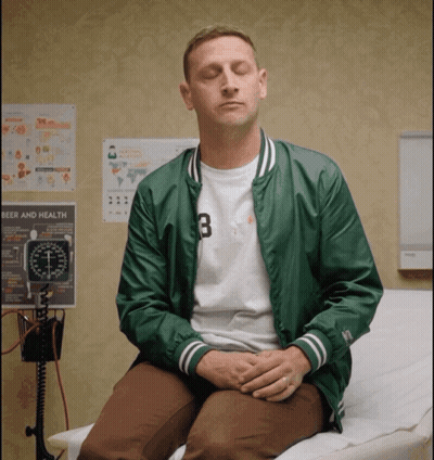 Man In Suit Making Funny Face GIF
