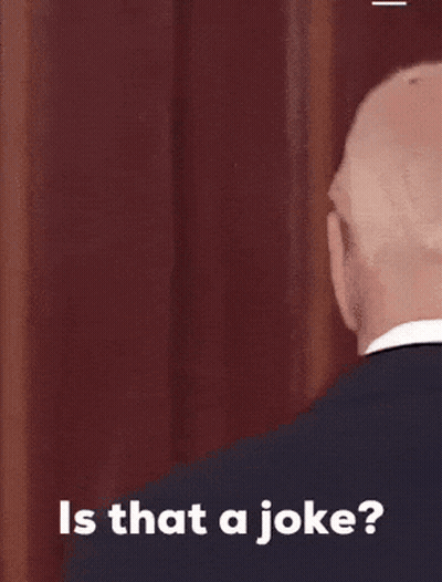 Man In Suit Making Funny Face Asking Is That A Joke GIF