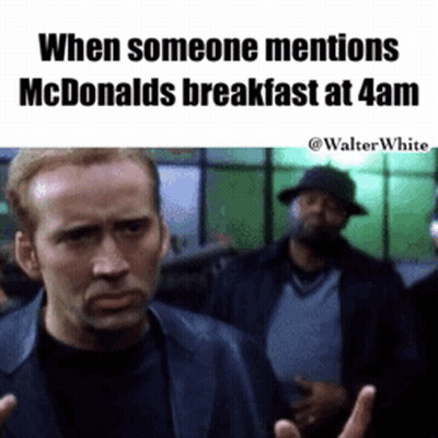 Man In Suit Making Funny Face At McDonald's Breakfast GIF