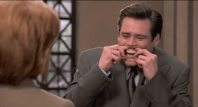 Man In Suit Making Funny Face GIF