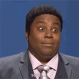 Man In Suit Making Funny Face GIF