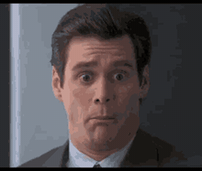 Man In Suit Making Funny Face GIF