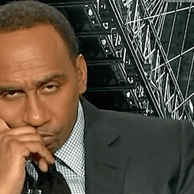 Man In Suit Making Funny Face GIF