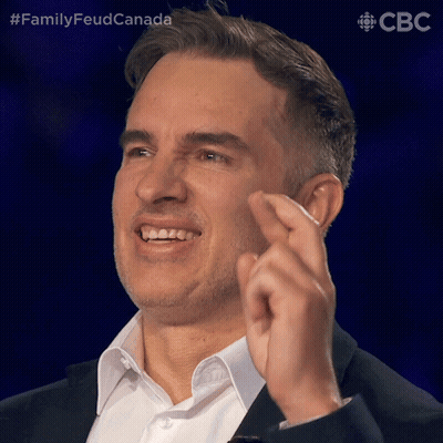 Man In Suit Making Funny Face GIF