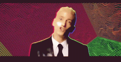 Man In Suit Making Funny Face GIF