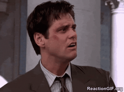 Man In Suit Making Funny Face GIF