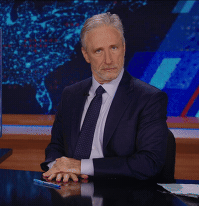 Man In Suit Making Funny Face Giving Thumbs Up GIF