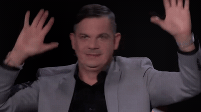 Man In Suit Making Funny Face Hands Up GIF