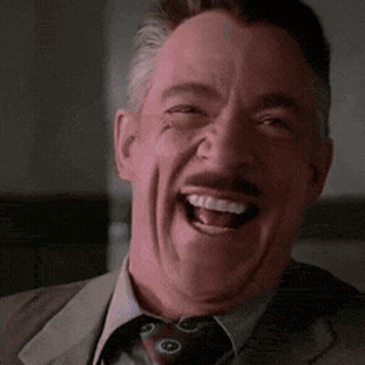 Man In Suit Making Funny Face GIF