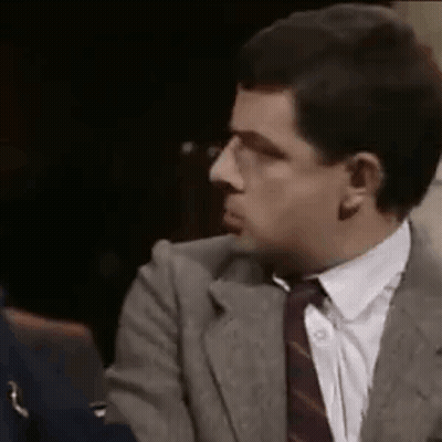 Man In Suit Making Funny Face GIF