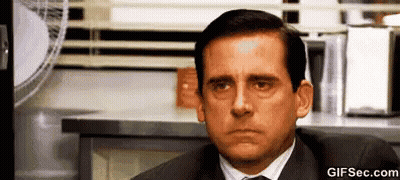 Man In Suit Making Funny Face GIF