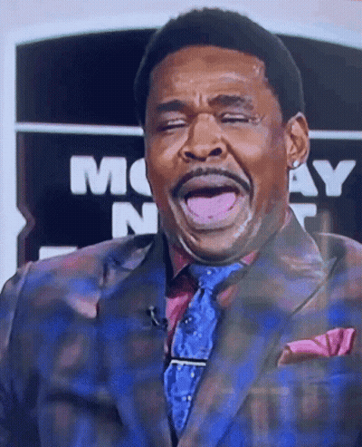 Man In Suit Making Funny Face GIF