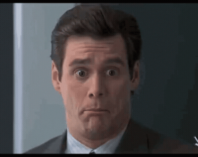 Man In Suit Making Funny Face GIF