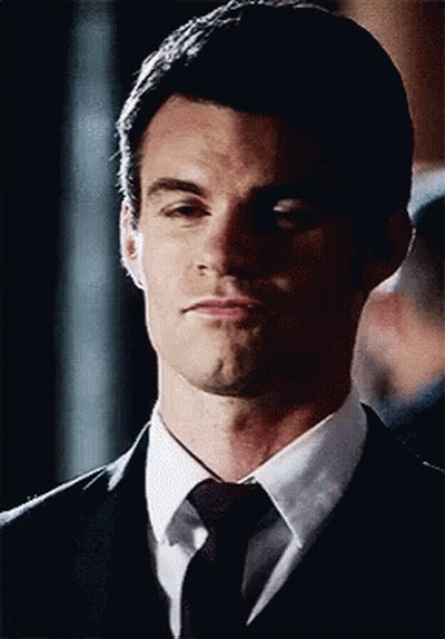 Man In Suit Making Funny Face GIF