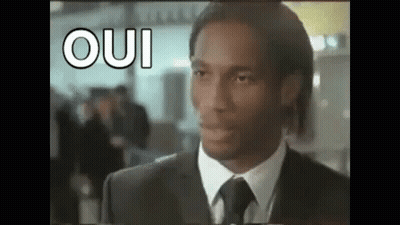 Man In Suit Making Funny Face GIF