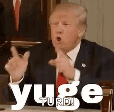 Man In Suit Making Funny Face Pointing At Camera GIF