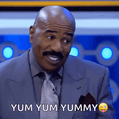 Man In Suit Making Funny Face GIF