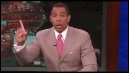 Man In Suit Making Funny Face GIF