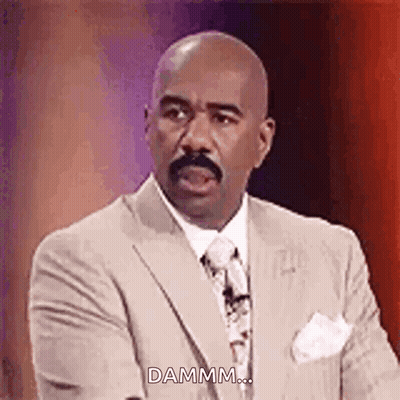 Man In Suit Making Funny Face Saying Damm GIF